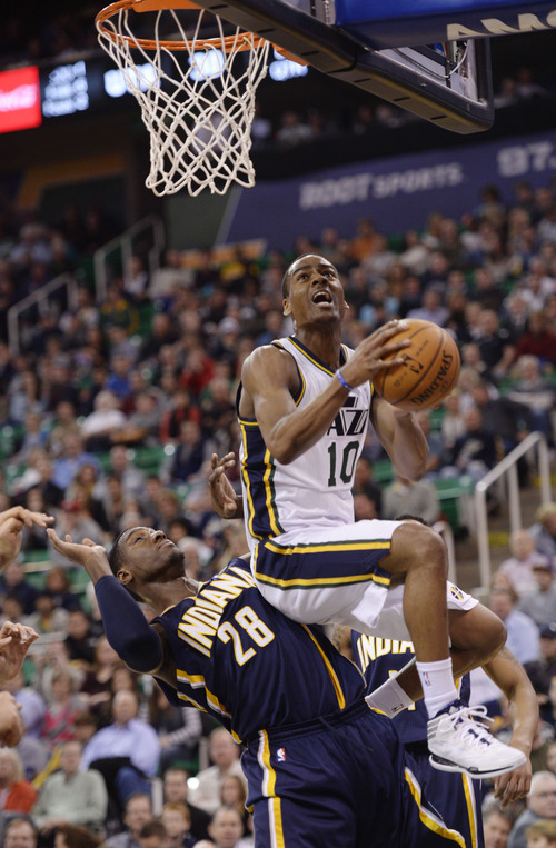 Steve Griffin  |  The Salt Lake Tribune


Utah Jazz point guard Alec Burks (10) leaps over Indiana Pacers center Ian Mahinmi (28) s he gets to the basket during first half action in the Utah Jazz versus Indiana Pacers at EnergySolutions Arena in Salt Lake City, Utah Thursday, December 5, 2013.