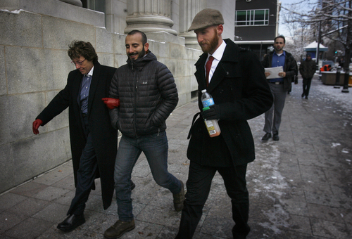 Scott Sommerdorf   |  The Salt Lake Tribune
Moudi Sbeity, center, and Derek Kitchen, right, arrive with their attorney Peggy A. Tomsic at U.S. District Court Wednesday morning, Dec. 4, 2013, to appear before Judge Robert J. Shelby who will hear arguments in the lawsuit brought by three couples who argue Utah's ban on same-sex marriage is unconstitutional.