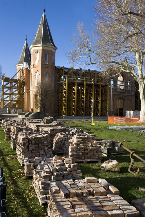 Al Hartmann   |  The Salt Lake Tribune 
Salvaged bricks are stacked on the north side of the Provo Tabernacle as stabilization and cleanup work continue on the historic structure on March 31, 2011. A lighting rig and human error are being blamed for the fire that devastated the Tabernacle more than three months ago.