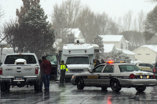 Chris Detrick  |  The Salt Lake Tribune
The scene near 745 Country Club in Stansbury Park Tuesday December 3, 2013. Officers were with the subject involved, the dispatch center posted on its Facebook page. "Officers are still on scene conducting an investigation, but the incident has been cleared." 
As of 1:10 p.m., the Tooele County Sheriff's Office dispatch center announced that the lock downs are being lifted.
