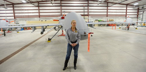 Steve Griffin  |  The Salt Lake Tribune


Jennifer Gillum, Rapid Integration Acceptance Center (RIAC) deputy director, stands with a Gray Eagle unmanned aircraft in a hangar at the Dugway Proving Ground, in Dugway Utah Thursday, December 5, 2013.