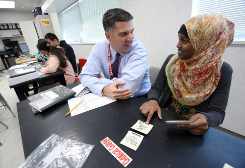 Francisco Kjolseth  |  The Salt Lake Tribune
Northwest Middle School principal Brian Conley speaks with Fathi Mohamud, 13, at the school where 87 percent of the student body is of color. The  Salt Lake City school has had three years of academic growth and on Thursday will host U.S. Secretary of Education Arne Duncan. The school gives teachers performance pay based on student achievement and growth and has created a culture where it's cool to be smart.