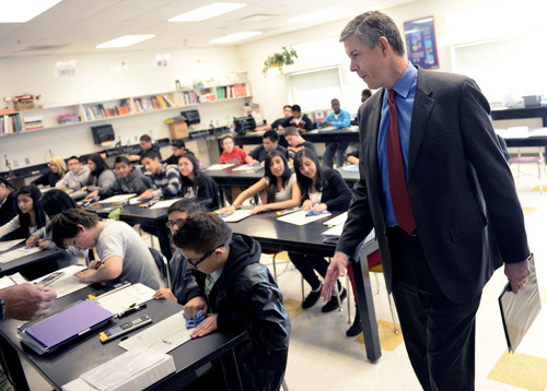 Al Hartmann  |  The Salt Lake Tribune
Education Secretary Arne Duncan observes students in Roger Haglund's 8th grade math class at Northwest Middle School in Salt Lake City Thursday Dec. 5, 2013. In 2010 the school got a $2.3 million federal School Improvement Grant.  Such grants target Title I schools with high populations of impoverished students. This school has shown dramatic improvement in academic performance over the three years.