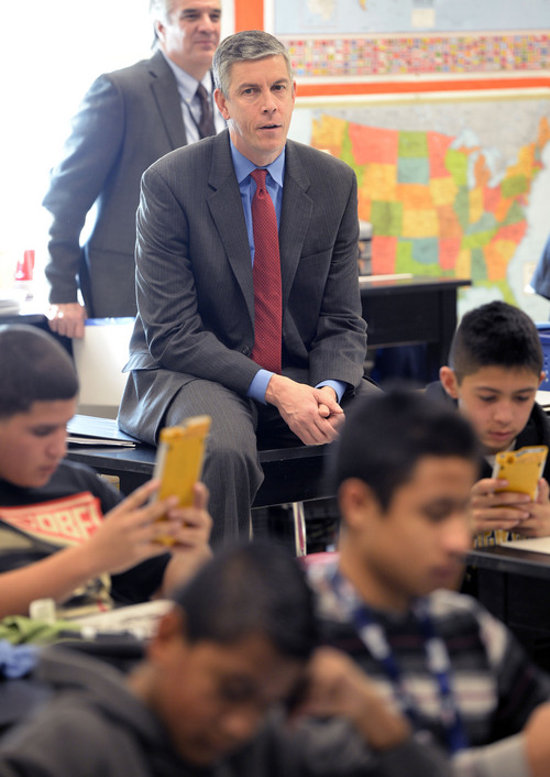 Al Hartmann  |  The Salt Lake Tribune
Education Secretary Arne Duncan observes students work through a problem on Npire calculators in Roger Haglund's 8th grade math class at Northwest Middle School in Salt Lake City Thursday Dec. 5, 2013. In 2010 the school got a $2.3 million federal School Improvement Grant. Such grants target Title I schools with high populations of impoverished students. This school has shown dramatic improvement in academic performance over the three years.