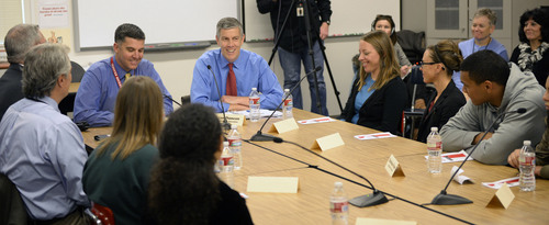 Al Hartmann  |  The Salt Lake Tribune
Education Secretary Arne Duncan, top center, has a roundtable discussion with parents teachers and educators at Northwest Middle School in Salt Lake City Thursday Dec. 5, 2013. In 2010 the school got a $2.3 million federal School Improvement Grant. Such grants target Title I schools with high populations of impoverished students. This school has shown dramatic improvement in academic performance over the three years.