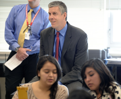 Al Hartmann  |  The Salt Lake Tribune
Education Secretary Arne Duncan observes students work through a problem on Npire calculators in Roger Haglund's 8th grade math class at Northwest Middle School in Salt Lake City Thursday Dec. 5, 2013. In 2010 the school got a $2.3 million federal School Improvement Grant.  Such grants target Title I schools with high populations of impoverished students. This school has shown dramatic improvement in academic performance over the three years.
