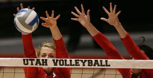 Steve Griffin | The Salt Lake Tribune

Utah's Shelby Dalton and Bailey Bateman team up to block a shot during volleyball match at the Huntsman Center in Salt Lake City, Utah Tuesday Sept. 17, 2013.