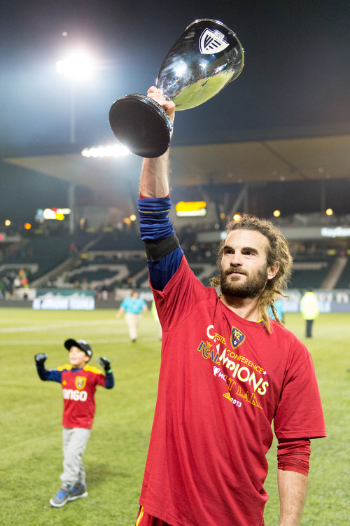 Trent Nelson  |  The Salt Lake Tribune
Real Salt Lake's Kyle Beckerman (5) holds aloft the trophy after Real Salt Lake defeated the Portland Timbers, MLS soccer Sunday November 24, 2013, in Portland.