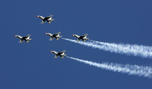 Scott Sommerdorf/The Salt Lake Tribune
The Air Force Thunderbirds fly in a "5-card" formation during the Hill Air Force Base Open House in 2012.
