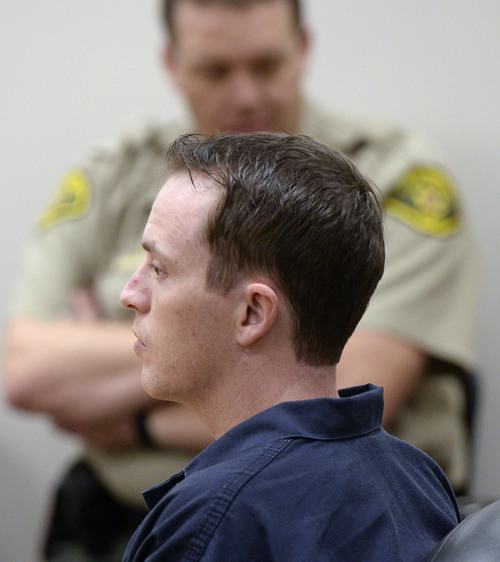 Al Hartmann  |  The Salt Lake Tribune
Conrad Truman enters Fourth District Court in Provo Friday December 6 for a preliminary hearing in the murder of his wife Heidi Truman in September 2012 and obstruction of justice.