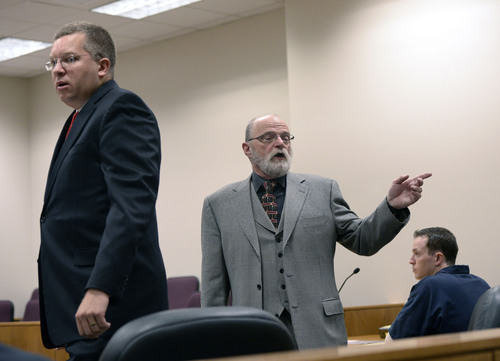 Al Hartmann  |  The Salt Lake Tribune
Prosecuter Craig Johnson, left,  and defense attorney Ron Yengich speak to Judge Samuel McVey in Conrad Truman's preliminary hearing in Fourth District Court in Provo Friday December 6.