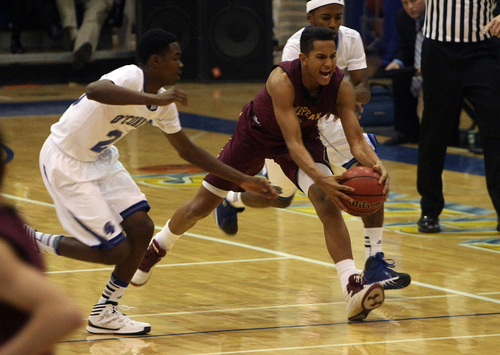 Scott Sommerdorf   |  The Salt Lake Tribune
Lone Peak's Frank Jackson fights for a loose ball against Bishop O'Connell's Jamaal King during second half play. Lone Peak defeated Bishop O'Connell 49-46 on TJ Haws' 3-point buzzer-beater at Orem High School, Friday December 6, 2013.