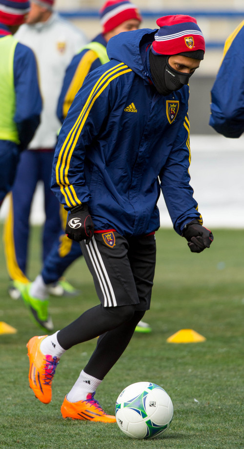 Trent Nelson  |  The Salt Lake Tribune
Real Salt Lake's Javier Morales (11) tries to stay warm during a training session at Sporting Park in Kansas City, Friday December 6, 2013.