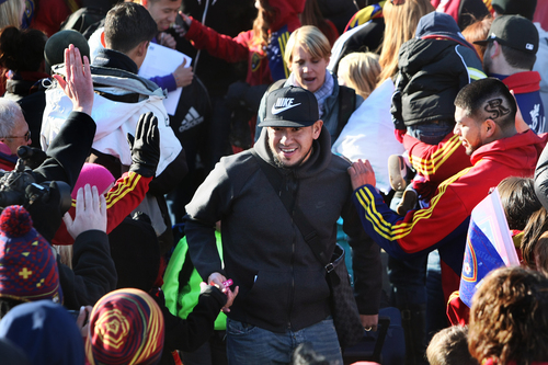 Scott Sommerdorf   |  The Salt Lake Tribune
RSL goalkeeper Nick Rimando is greeted by fans as he makes his way through a sea of fans as he and other Real Salt Lake players and coaches arrive in Salt Lake at the TAC Air sports terminal, Sunday December 8, 2013.