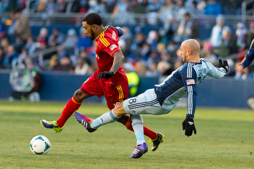 Trent Nelson  |  The Salt Lake Tribune
Real Salt Lake's Robbie Findley (10) is tripped up by Sporting KC's Aurelien Collin (78) as Real Salt Lake faces Sporting KC in the MLS Cup Final at Sporting Park in Kansas City, Saturday December 7, 2013.