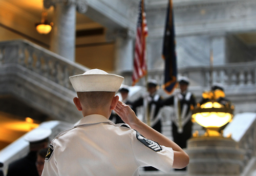 Scott Sommerdorf   |  The Salt Lake Tribune
A young Naval Sea Cadet salutes during the posting of the colors in the rotunda of the Utah State Capitol on Saturday. The Great Salt Lake Division of the Naval Sea Cadet Corps was recommissioned as the NSCC Battleship Utah (BB-31), allowing a closer tie to the Navy and the State of Utah and to honor the USS Utah as well as her crew members who served and went down with her.