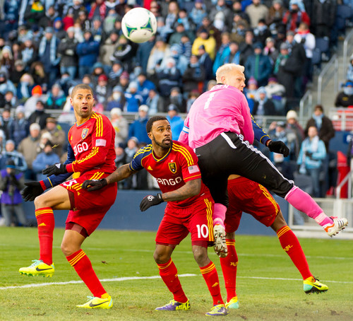 Trent Nelson  |  The Salt Lake Tribune
RSL's Alvaro Saborio, Robbie Findley (10), Chris Schuler (28) and Sporting KC's Jimmy Nielsen (1) watch a near miss by Saborio as Real Salt Lake faces Sporting KC in the MLS Cup Final at Sporting Park in Kansas City, Saturday December 7, 2013.