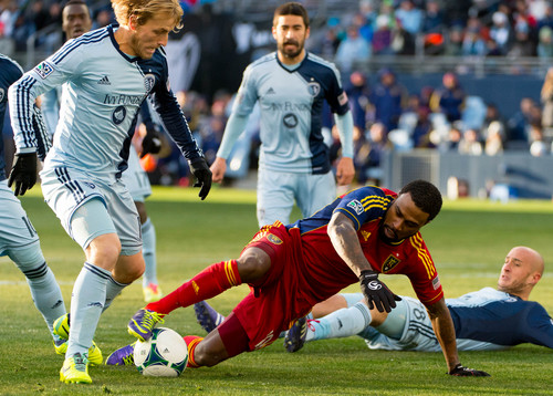 Trent Nelson  |  The Salt Lake Tribune
Real Salt Lake's Robbie Findley (10) tries to control the ball as Sporting KC's Chance Myers (7) moves in as Real Salt Lake faces Sporting KC in the MLS Cup Final at Sporting Park in Kansas City, Saturday December 7, 2013.
