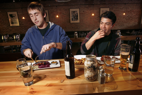 Scott Sommerdorf   |  The Salt Lake Tribune
Kipplan Robinson, left, and Phillip Trujillo have lunch at The Annex, a new gastropub by the same folks who own Epic Brewing.