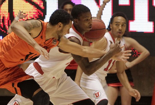 Leah Hogsten  |  The Salt Lake Tribune
Utah Utes guard Delon Wright  fights Idaho State Bengals guard Andre Hatchett (15) from stealing the ball. University of Utah defeated Idaho State Bengals
74-66, December 10, 2013 at the Huntsman Center.