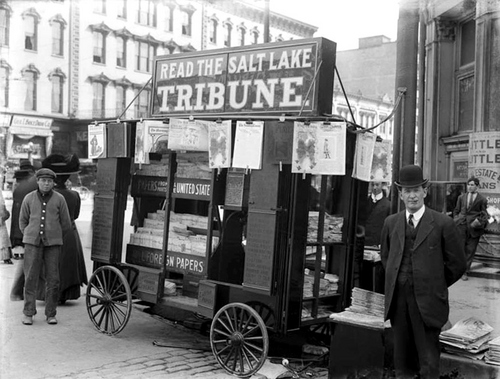 Photo Courtesy Utah State Historical Society

Salt Lake Tribune newsstand on the southwest corner of the intersection of 200 South and Main Street in 1910.