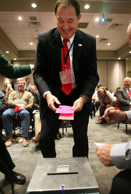 Scott Sommerdorf   |  The Salt Lake Tribune
Utah Governor Gary Herbert votes in one of five seperate ballots as The Republican State Central Committee met to choose three names to send to the Governor to replace AG John Swallow. After five ballots they chose: Sean Reyes, Robert Smith, and finally Brian Tarbet, Saturday December 13 2013.