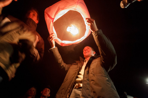 Trent Nelson  |  The Salt Lake Tribune
Robbie Parker releases a lantern in memory of his daughter, Emilie Parker, following a public memorial for Emilie Parker at Ben Lomond High School in Ogden, Thursday December 20, 2012. Lanterns were lit and released for each victim killed in the Sandy Hook Elementary School shooting