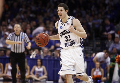 Jim Urquhart  |  The Salt Lake Tribune

Jimmer Fredette is ecstatic after scoring 37 points in a double-overtime victory over Florida in the first round of the NCAA Tournament in 2010. The win propelled the Cougars to the second round of the NCAA tournament for the first time in 17 years.