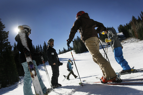 Scott Sommerdorf   |  The Salt Lake Tribune file photo
Skiers talk at the base of Solitude's Little Dollie run. Snow sports equipment sales are up in dollar figures, but flat or lower in units sold, according to a new survey.