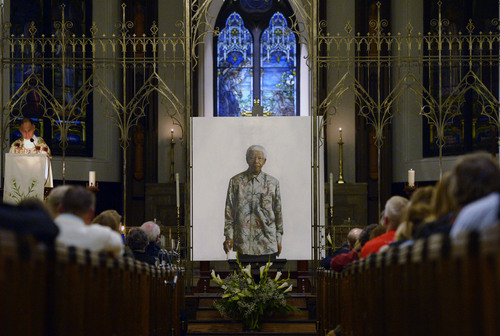 Steve Griffin  |  The Salt Lake Tribune

The public gets a close look at an original oil painting of Nelson Mandela by artist Robert McCurdy during a service to Remember, Reflect and Celebrate the life of Nelson Mandela at The Cathedral Church of St. Mark in Salt Lake City Sunday, December 15, 2013. The service will was a quiet, reflective service with prayer, silent reflection, music, and poetry.