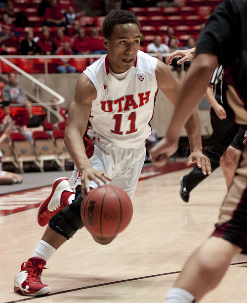 Michael Mangum  |  Special to the Tribune

Utah guard Brandon Taylor (11) drives into pressure during their game against the Willamette Bearcats at the Huntsman Center on Friday, November 9, 2012. The Utes beat the Bearcats 104-47.