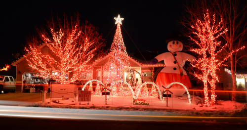 Keith Johnson | The Salt Lake Tribune

A long  exposure shows cars driving past the home located at 6388 S. Wakefield Way in West Valley City, Utah, December 17, 2013. When parked in front of the home, visitors can tune their radio to a frequency and watch the light display dance to the music.