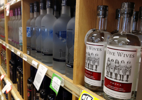 Bottles of Ogden's Own Distillery Five Wives Vodka are stocked at a state liquor store in Salt Lake City, Tuesday May 29, 2012. The state of Utah issued has issued two new distillery licenses. (AP Photo/Brian Skoloff)