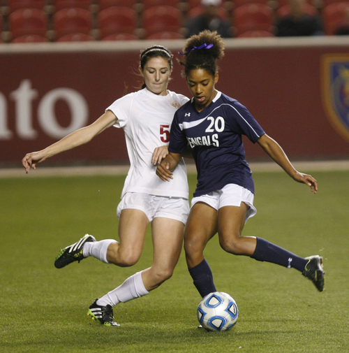 Keith Johnson | The Salt Lake Tribune

Viewmont's Abbie Flandro (left) battles for the ball with Brighton's Nadia Gomes during the girls 5A soccer championship game at Rio Tinto stadium in Sandy, Utah, October 25, 2013. Brighton went on to win 1-0.