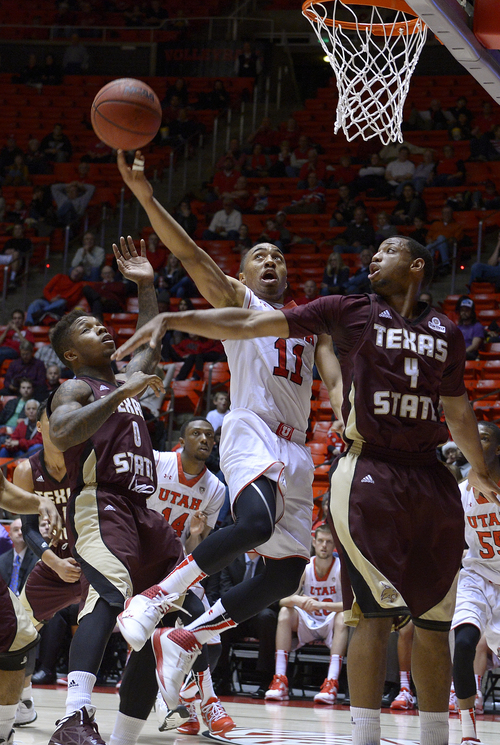 Scott Sommerdorf   |  The Salt Lake Tribune
Brandon Taylor goes up for two of his 18 points during second half play. Utah beat Texas State 69-50, Wednesday December 18, 2013.Scott