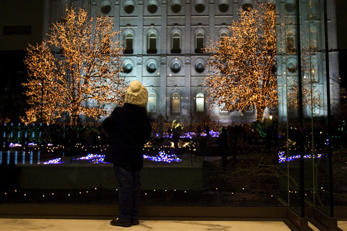 Chris Detrick  |  The Salt Lake Tribune 
Sadie Christiansen, 3, of Salt Lake City, looks at the Christmas lights at Temple Square in Salt Lake City Friday November 26, 2010.