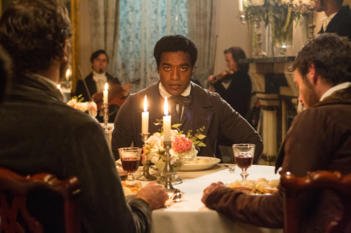 This film publicity image released by Fox Searchlight shows Chiwetel Ejiofor in a scene from "12 Years A Slave." The film, by director Steve McQueen, is being hailed a masterpiece and a certain Oscar heavyweight. (AP Photo/Fox Searchlight Films, Jaap Buitendijk)