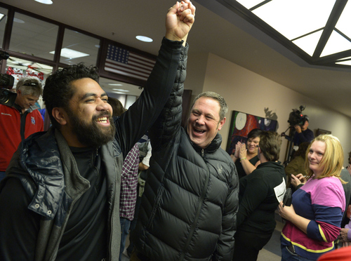 Keith Johnson | The Salt Lake Tribune

Brian Morris, right, and his new husband Noni Blake celebrate after they were married by Salt Lake City mayor Ralph Becker outside the Salt Lake County clerks office, Friday, December 20, 2013. A federal judge in Utah Friday struck down the state's ban on same-sex marriage, saying the law violates the U.S. Constitution's guarantees of equal protection and due process.
