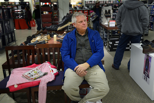 Scott Sommerdorf   |  The Salt Lake Tribune
Tom Given sits in the shoe section and waits patiently for his wife, Charlene, to finish shopping for some of their 15 grandchildren at the JC Penney store in the Valley Fair Mall on Saturday.