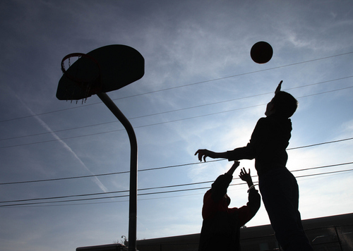 Keith Johnson | The Salt Lake Tribune

Hawthorne Elementary School students play basketball outside during recess, December 17, 2013.