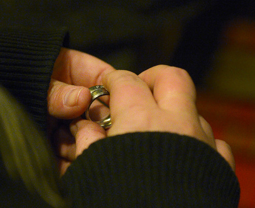 Steve Griffin  |  The Salt Lake Tribune


Kristan Frahm, of Clinton, holds her wedding rings as she waits in line to get married, with her wife, Rachel Frahm at the Hampton Inn Suites in Ogden, Utah Monday, December 23, 2013. Volunteer clergy were performing marriage ceremonies for couples across the street from the Weber County Clerk's Office in downtown Ogden.