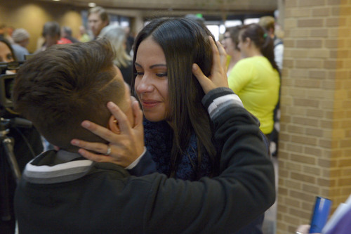 Francisco Kjolseth  |  The Salt Lake Tribune
Angela Marinez, left, embraces her wife Monique Lobato in a kiss after being married in the lobby of the Salt Lake County offices on Monday, Dec. 23, 2013. A federal judge in Utah struck down the state's ban on same-sex marriage last Friday, saying the law violates the U.S. Constitution's guarantees of equal protection and due process.