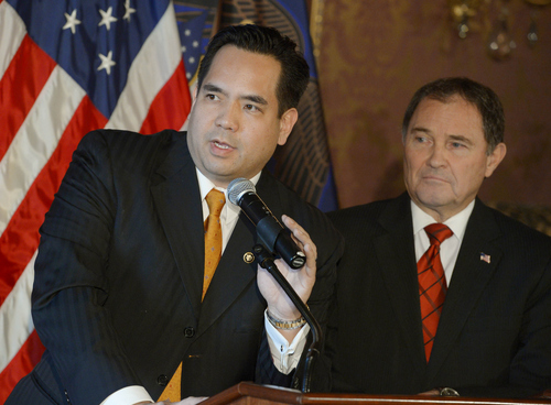 Keith Johnson | The Salt Lake Tribune

New Utah Attorney General Sean Reyes, left, and Utah Governor Gary Herbert answer questions about Utah's gay marriage ruling, December 23, 2013 after Governor Herbert announced Reyes as Utah's new attorney general. Reyes takes office after former Attorney General John Swallow resigned amid allegations of impropriety.
