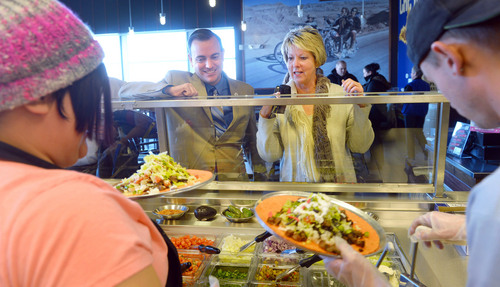 Steve Griffin  |  The Salt Lake Tribune


West Valley Mayor Mike Winder smiles as he orders a burrito during a ribbon cutting ceremony for Freebirds World Burrito, in West Valley City, Utah Monday, December 9, 2013.