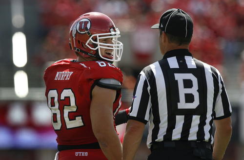 Scott Sommerdorf   |  The Salt Lake Tribune
Utah Utes tight end Jake Murphy (82) talks with a referee after Weber State was called for pass interference. Utah cruised to a 49-0 halftime lead over Weber State, Saturday, September 7, 2013.