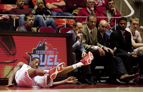 JIM MCAULEY | The Salt Lake Tribune
Utah's Delon Wright falls while chasing a loose ball during a game against the St. Katherine Firebirds at the University of Utah's Huntsman Center on December 28, 2013.