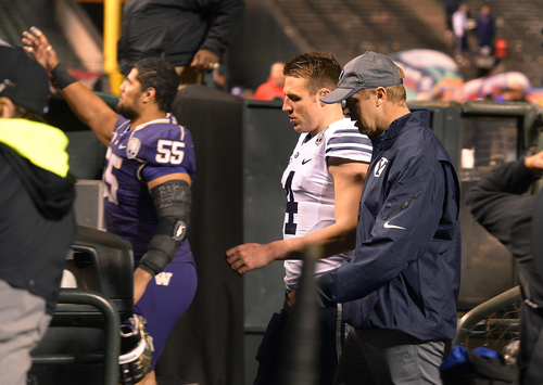 Scott Sommerdorf   |  The Salt Lake Tribune
BYU QB Taysom Hill and head coach Bronco Mendenhall walk off the field after their loss in the Fight Hunger Bowl game. Washington beat BYU 31-16 in the Fight Hunger Bowl at AT&T Park in San Francisco, Friday December 27, 2013.