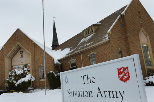 Scott Sommerdorf   |  The Salt Lake Tribune
The Salt Lake Congregation of the Salvation Army is meeting in an old Mormon wardhouse, reconfigured for the Army's use, Sunday December 22, 2013.