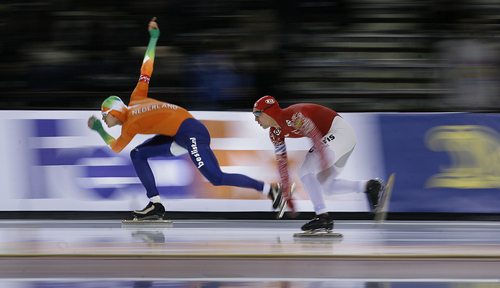 Scott Sommerdorf   |  The Salt Lake Tribune
Hein Otterspeer of the Netherlands, left, and Dmitry Lobkov of Russia race in the Men's 1000m at the ISU Sprint World Championships at the Utah Olympic Oval, Sunday, January 27, 2013. Michel Mulder of The Netherlands is the Men's ISU Sprint World Champion with team mate Otterspeer finishing third.