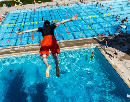 Trent Nelson  |  The Salt Lake Tribune
Enoch Foster dives from the platform at the Cottonwood Heights Recreation Center Wednesday July 10, 2013.